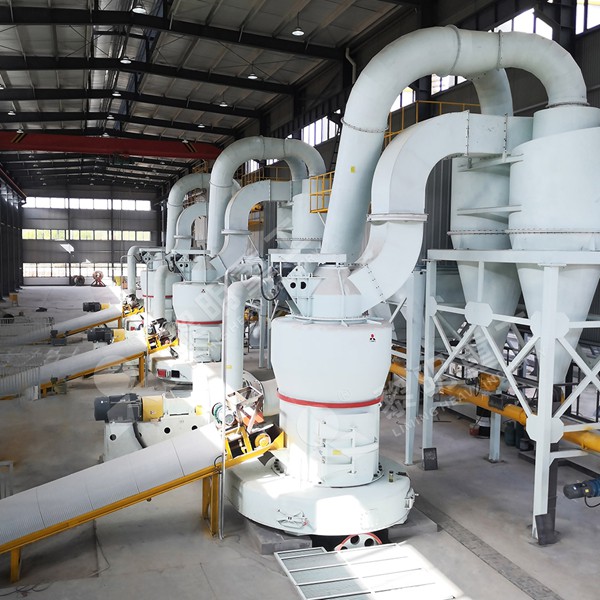 A modern LIMING Raymond Mill installation in a calcite processing plant, showing clean lines and integrated dust collection system.