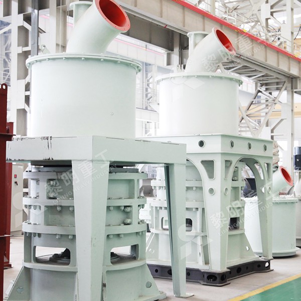 Control panel and external view of an MW Micro Powder Mill system, highlighting its compact and modern design.